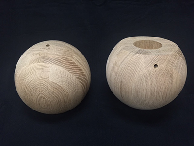 7.5-inch white oak lamp base balls - drilled, sanded smooth, and ready for finishing.