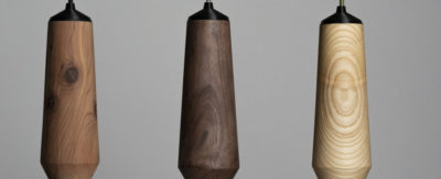 Three wood lighting design components.