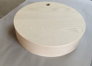 A lamp base made of laminated ash. CNC routed and drilled.