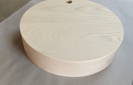 A lamp base made of laminated ash. CNC routed and drilled.