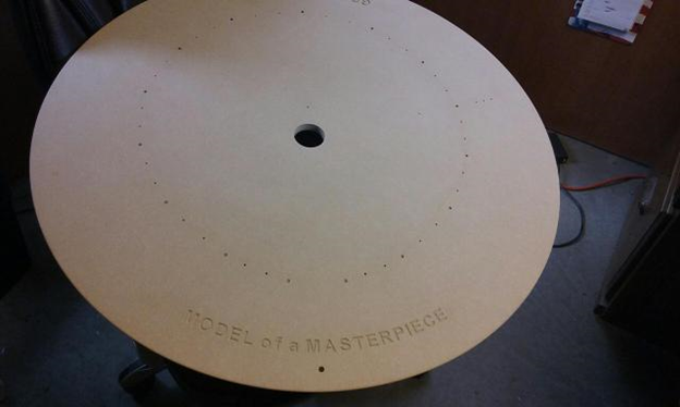 Large custom base drilled to exacting specifications with routed logo from MDF.
