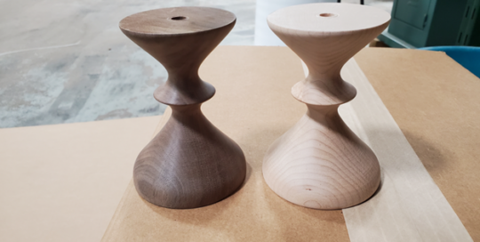 Pair of turned lamp bases made from laminated walnut and hard maple with sculpted hourglass profiles.