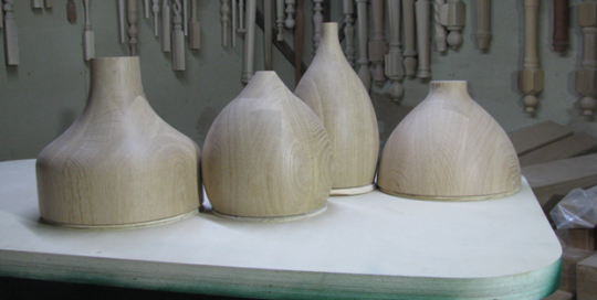 Laminated and turned white oak pendant shades in various profiles, unfinished and ready for hardware.